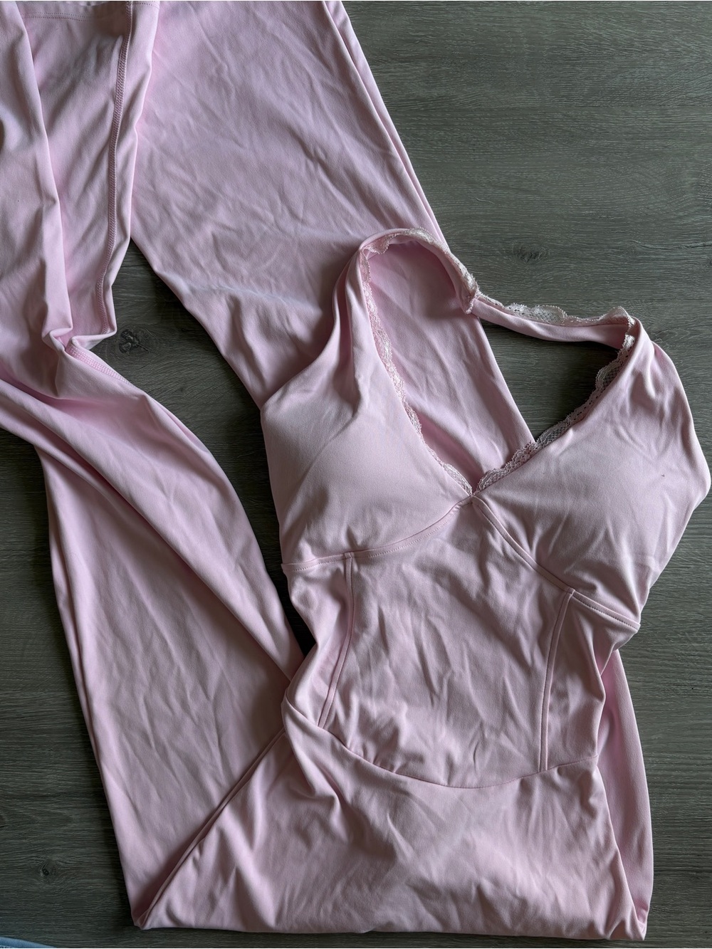 Pink lace trim bodysuit